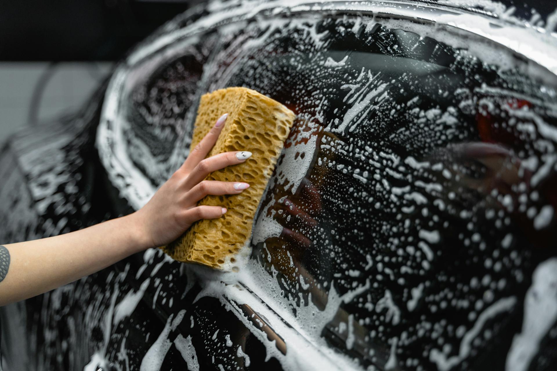 Car being hand washed