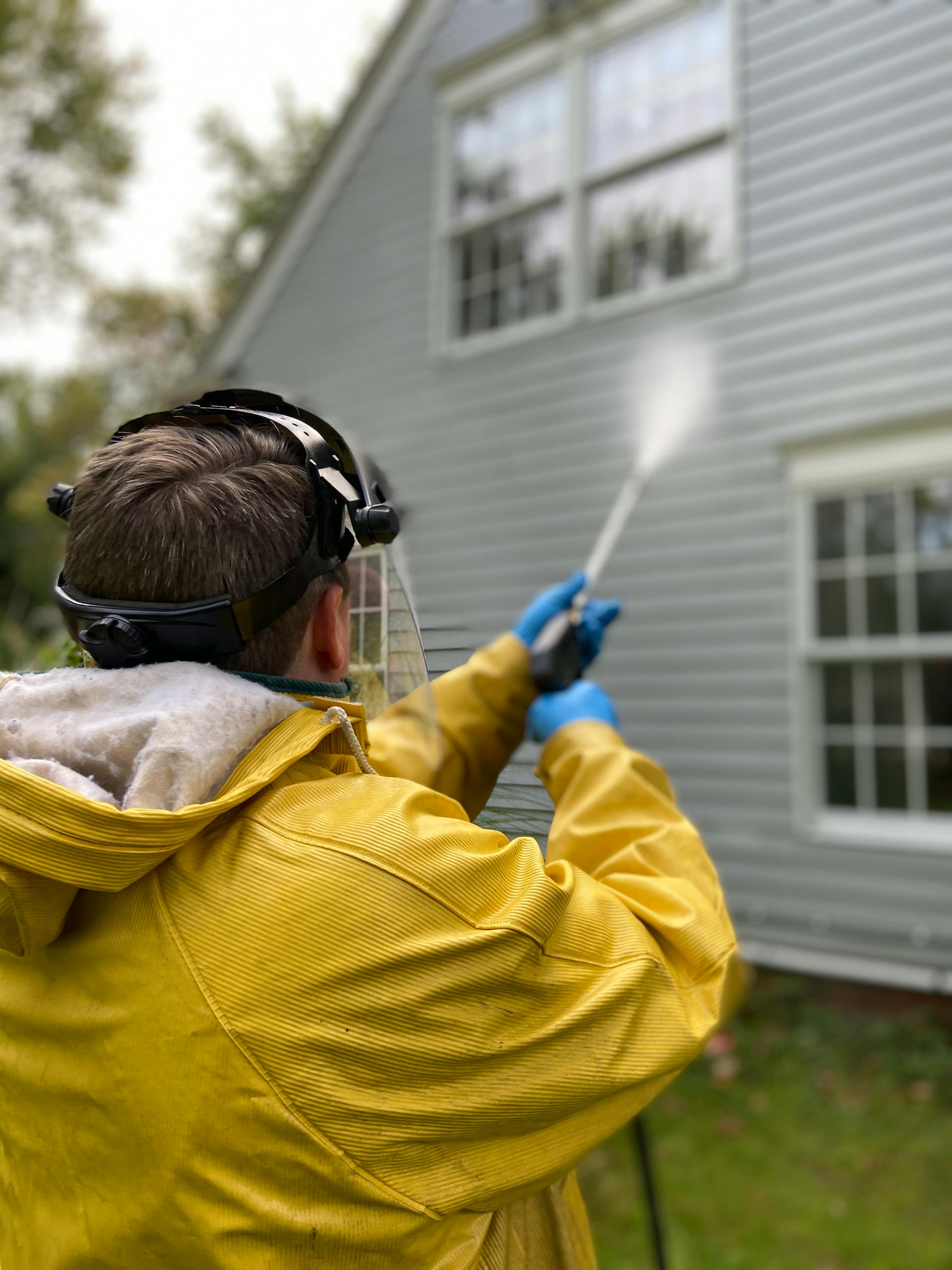 Pressure washing siding